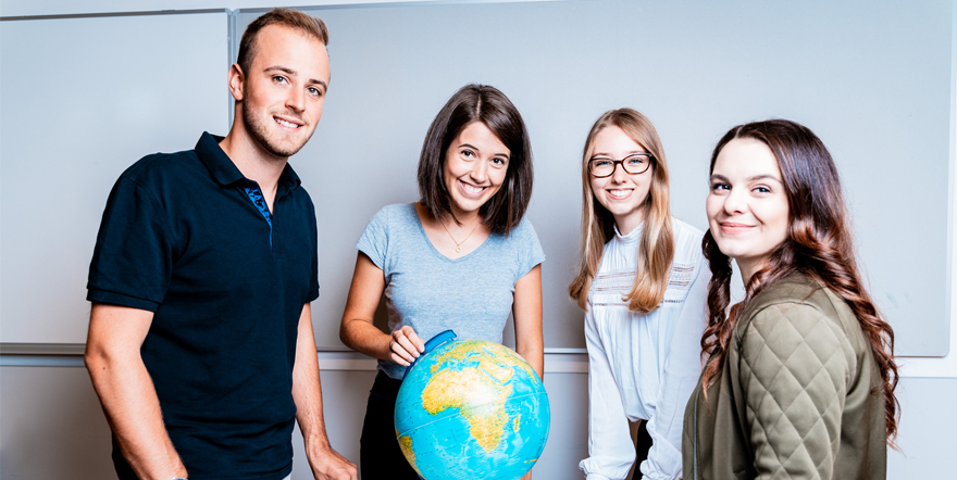 Students with a globe